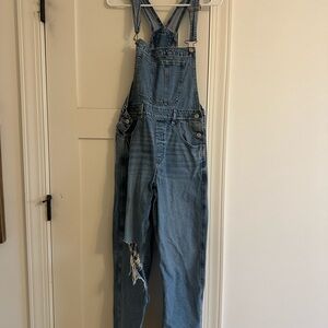 Classic Blue Denim Overalls American Eagle with rip at knee
